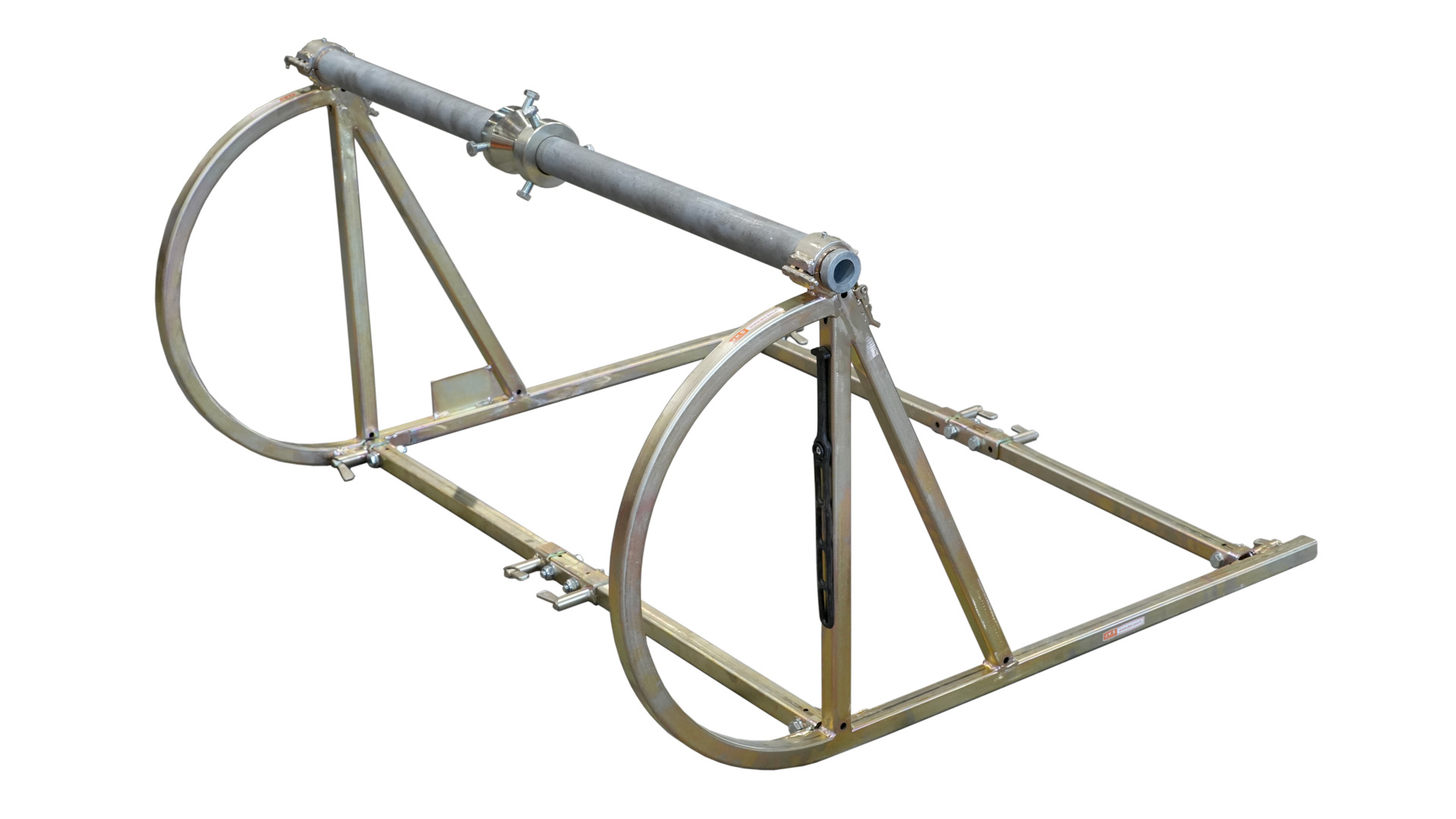 JKS products RS 12 -kelapukki, kokoontaitettava ja kevyt sinkitty metallirunko, suunniteltu erityisesti pienempien K10-kelojen käsittelyyn. Kuvassa näkyy pukin vipumekanismi, joka mahdollistaa kelan helpon noston ilman jarrua, sekä rakenteen taittomekanismi, joka helpottaa kuljetusta ja säilytystä.